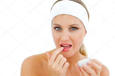 Attractive woman applying lip balm — Stock Photo © Wavebreakmedia #10297575