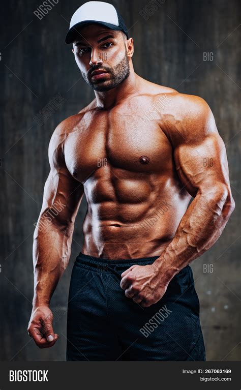 Young Strong Man Image &amp; Photo (Free Trial) | Bigstock