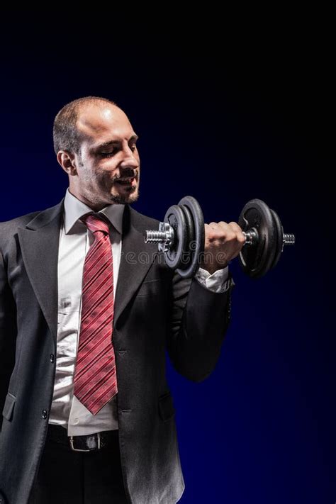 Businessman Lifting Weights Stock Image - Image of caucasian, athletic ...