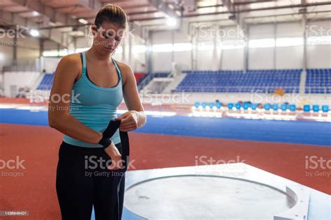 Teenage Athlete Wraps Bandages On Her Wrist Stock Photo - Download ...