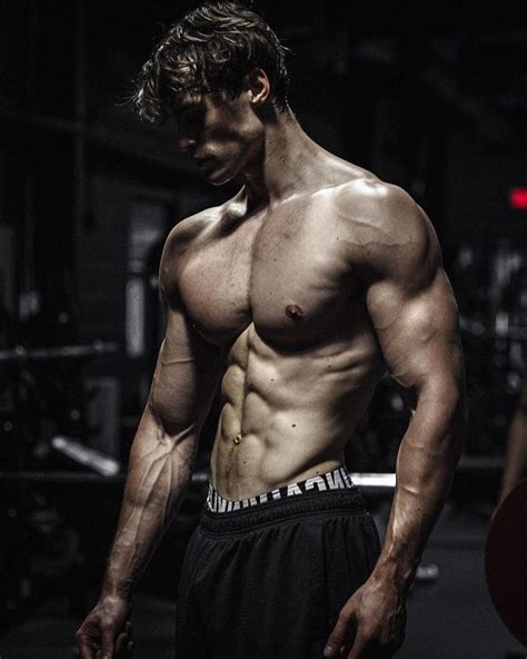 Download Athletic Shirtless Muscle Man Wallpaper | Wallpapers.com