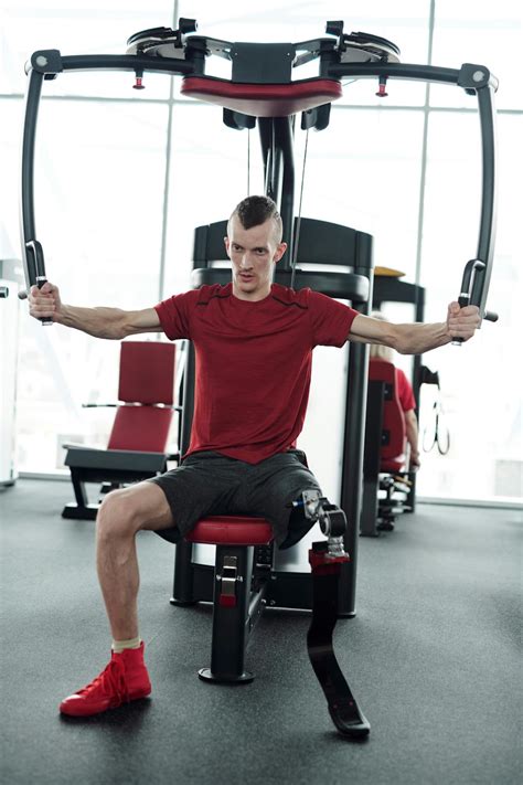 Photo Of Man Lifting Weights · Free Stock Photo