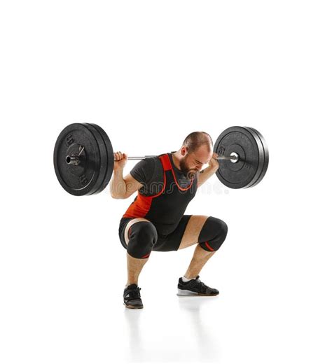 Muscular, Strong Young Athlete, Bodybuilder Doing Squats and Lifting ...