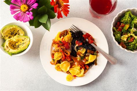 A Nutritious and Delicious Breakfast Plate Featuring Black Rice with ...