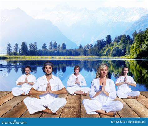Group of People Doing Meditation Near Mountain Range Stock Image ...